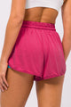 Short Arredondado de Poliamida com Bolso Rosa