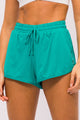 Short Arredondado Poliamida com Bolso Malaquita