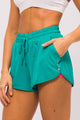 Short Arredondado Poliamida com Bolso Malaquita