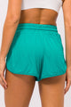 Short Arredondado Poliamida com Bolso Malaquita