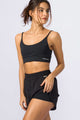 Short Furadinho Arredondado com Bolso Preto
