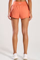 Short Duplo com Bolso Interno Laranja