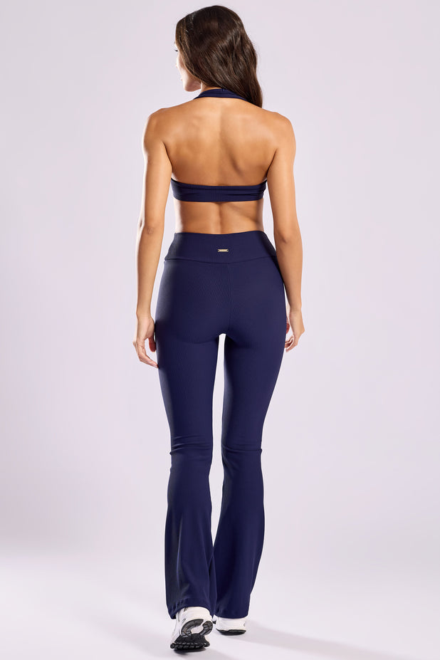 Conjunto Fitness Canelado Top Frente Única e Calça Flare Azul