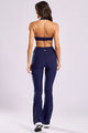 Conjunto Fitness Canelado Top Frente Única e Calça Flare Azul