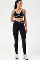 Conjunto Fitness Top e Calça Preta com Detalhe em Viés