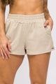 Short Bainha Dobrada Texturizado Bege