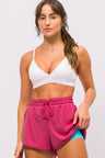 Short Arredondado de Poliamida com Bolso Rosa