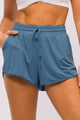 Conjunto Regata Curta e Short de Corrida Real Teal